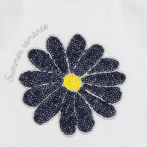 Bloemengestikt set met pailletten en short met stippen 