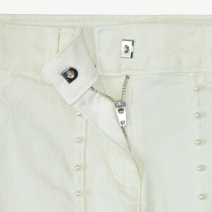 Jean large à poches avec perles nacrées fille 