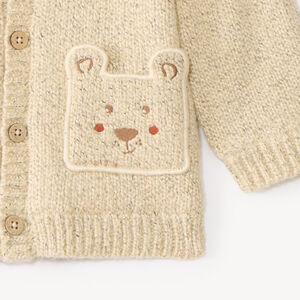 Gilet tricot met capuchon voor jongen met speelse zakken 