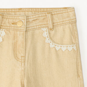 Jean large uni avec poches fantaisie fille 