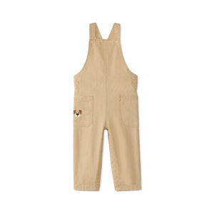 Langere jongensbaby overall met geborduurde hondenkop. 
