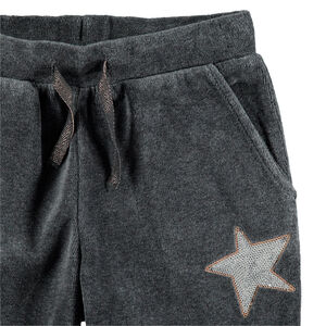 Fluwelen joggingbroek met ster van lovertjes 