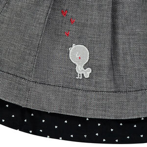 Setje van tuniek met decoratieve steek en effen legging 