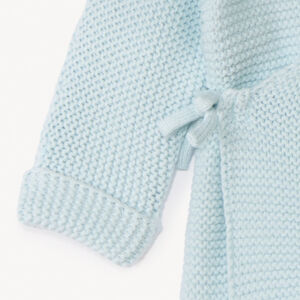 Effen tricot babybustier in mousse ste stitch. 