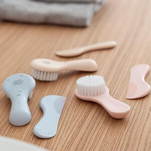 Set borstel en kam roze Suavinex 