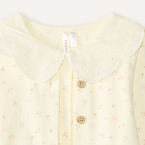 Tweedelig set voor baby meisjes: rompertje met vesteffect en legging. 