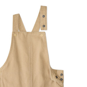 Langere jongensbaby overall met geborduurde hondenkop. 