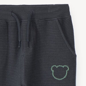 Joggingbroek voor babyjongen van honingraatstof met teddybeerprint 