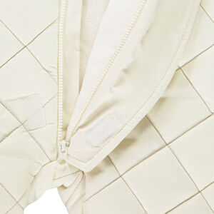 Combi-pilote matelassée à carreaux pour bébé avec finitions différentes selon l'âge 