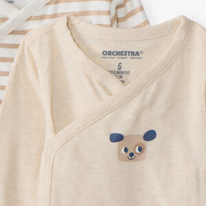 Set van 7 bodies met lange mouwen in jersey, met verschillende sluitingen afhankelijk van de leeftijd 