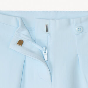 Pantalon large à pinces et fleur brodée fille 