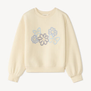 Gevoerd sweatshirt voor meisjes met geborduurde bloemen. 