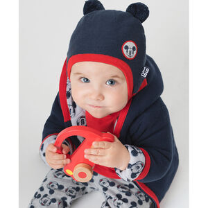Peruviaanse tricotmuts met Disney Mickeybadge en pompons 