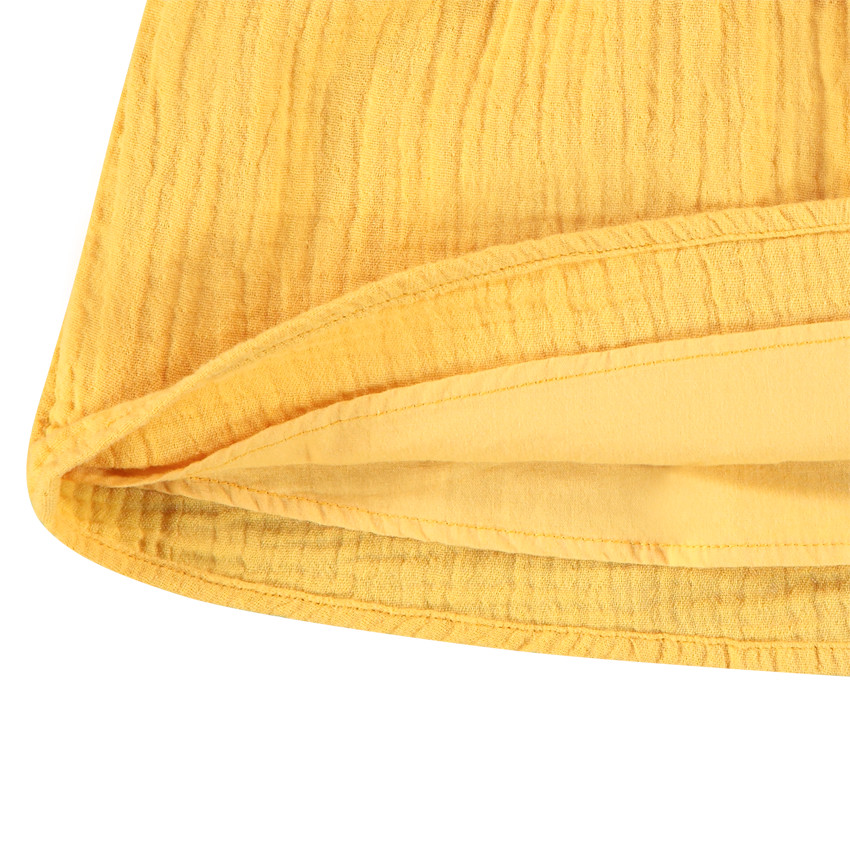 Gele tuniek in katoengaas voor baby meisjes. 