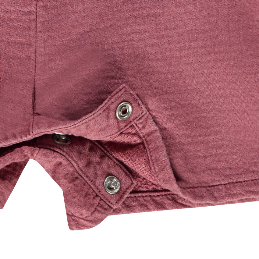 Korte gebreide salopette met knopen voor babymeisjes 