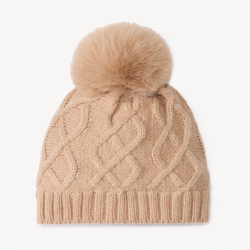 Bonnet pompon en tricot pour bébé fille 