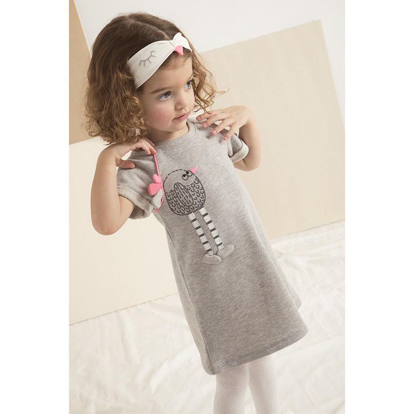 Speelse hoofdband met vogel voor meisjes 