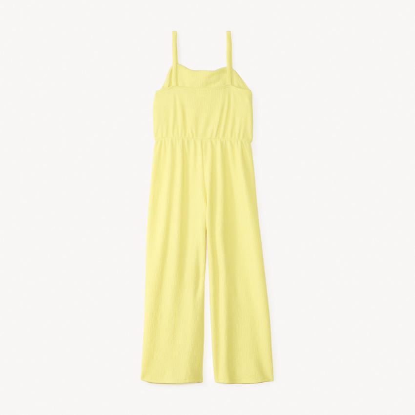 Combinaison en jersey crêpé uni avec buste drapé fille 
