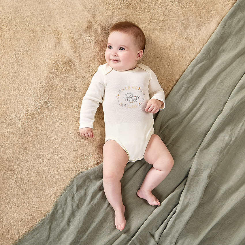 Lot de 7 bodies fantaisie en maille côte pour bébé fille  