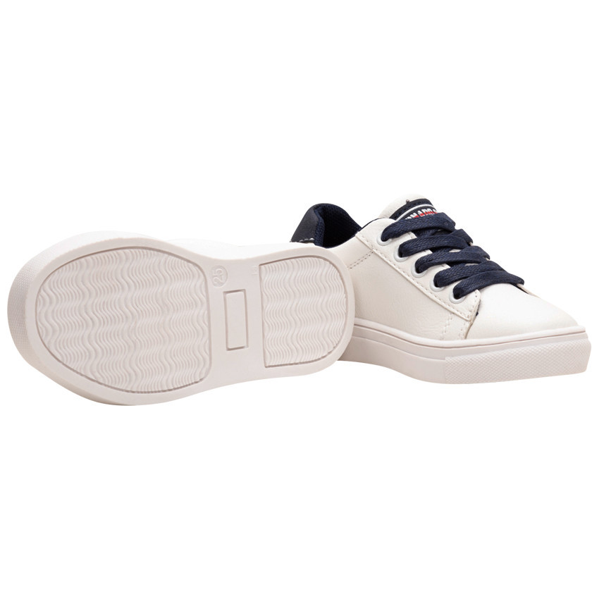 Lage witte kindersneakers met strepen aan de zijkant voor jongens 