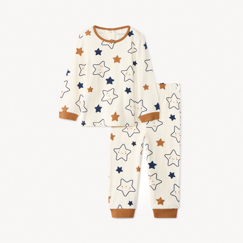 Set pyjama imprimé étoiles pour bébé garçon avec finitions différentes selon l'âge 