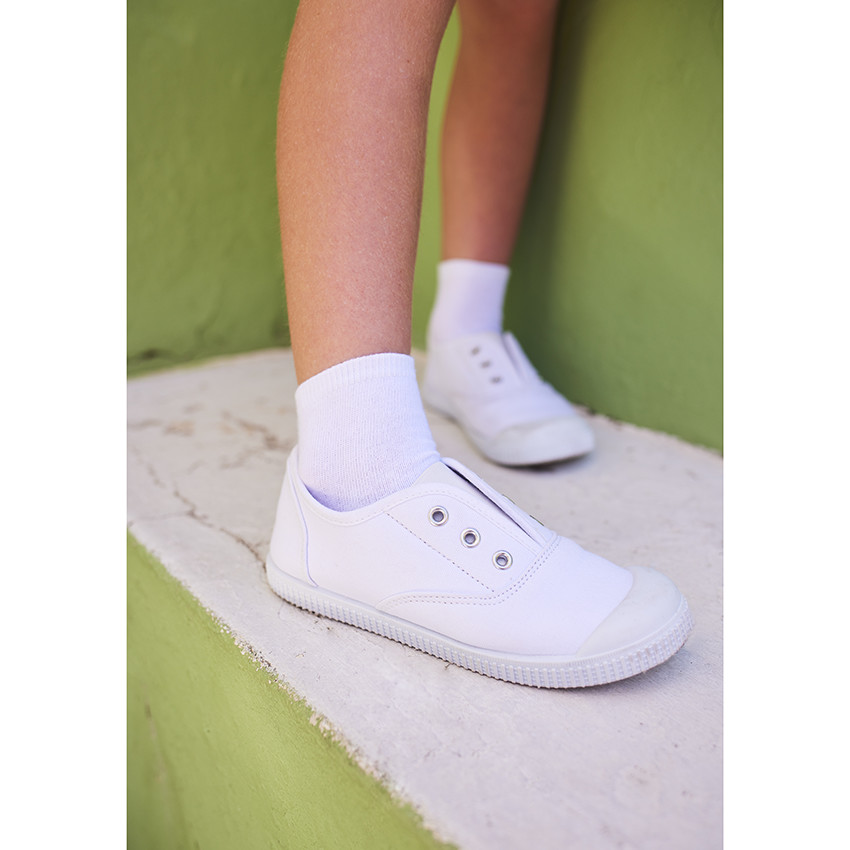 Tennis basses blanches avec languette élastiquée mixtes 