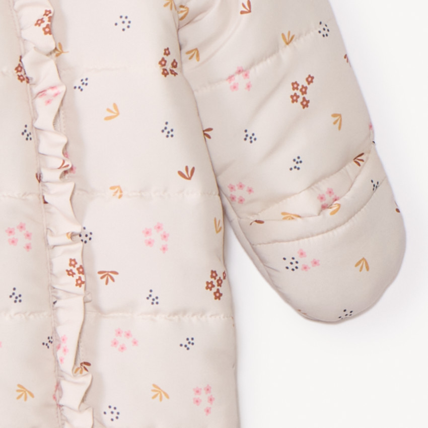 Combi-pilote imprimé fleurs pour bébé fille avec finitions différentes selon l'âge 