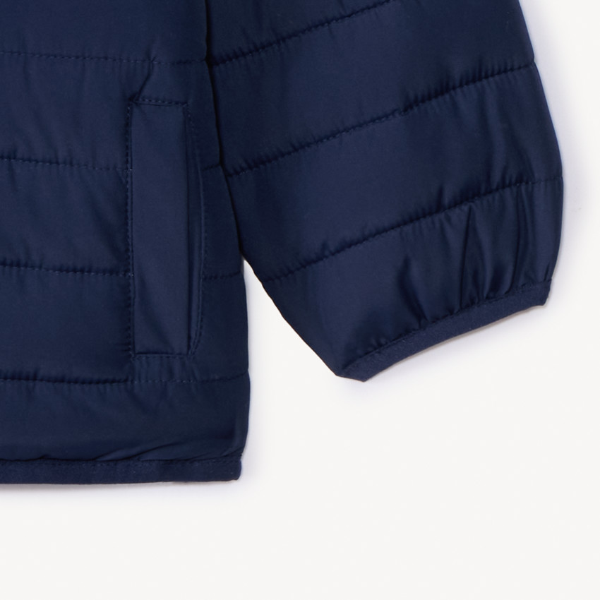 Donsjas met kap voor baby jongen 