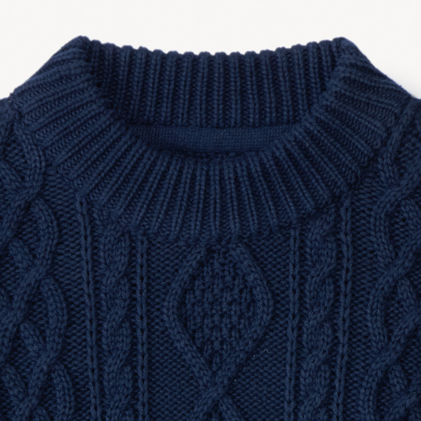 Pull en tricot uni effet torsadé avec liseré coloré pour garçon  