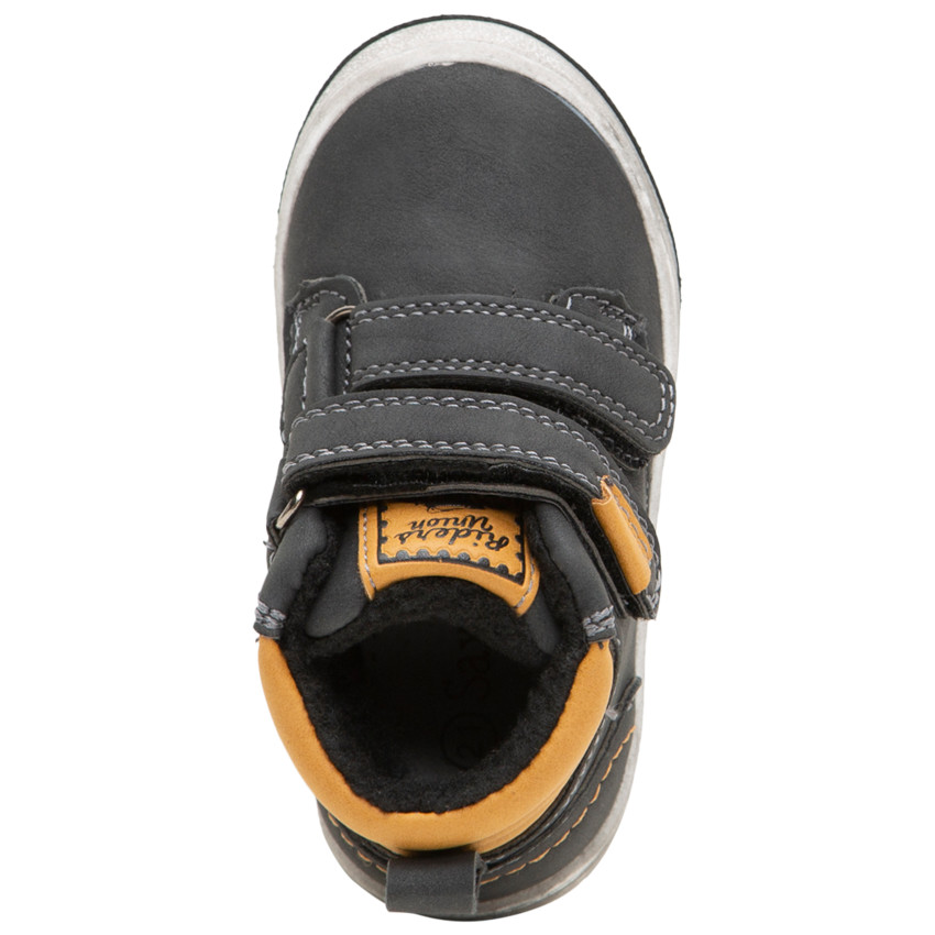 Laarsjes met ledereffect, klittenbandsluiting en contrasterende rand 