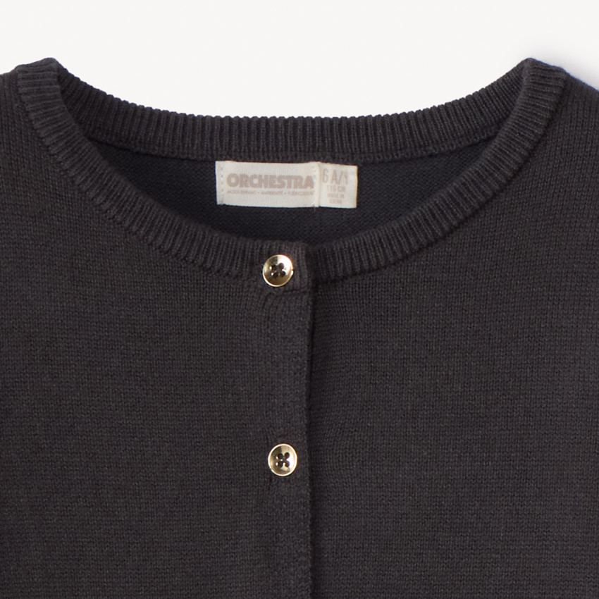 Gilet en tricot uni festonné pour fille 