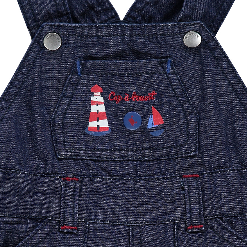 Salopette en denim effet used avec prints fantaisie 