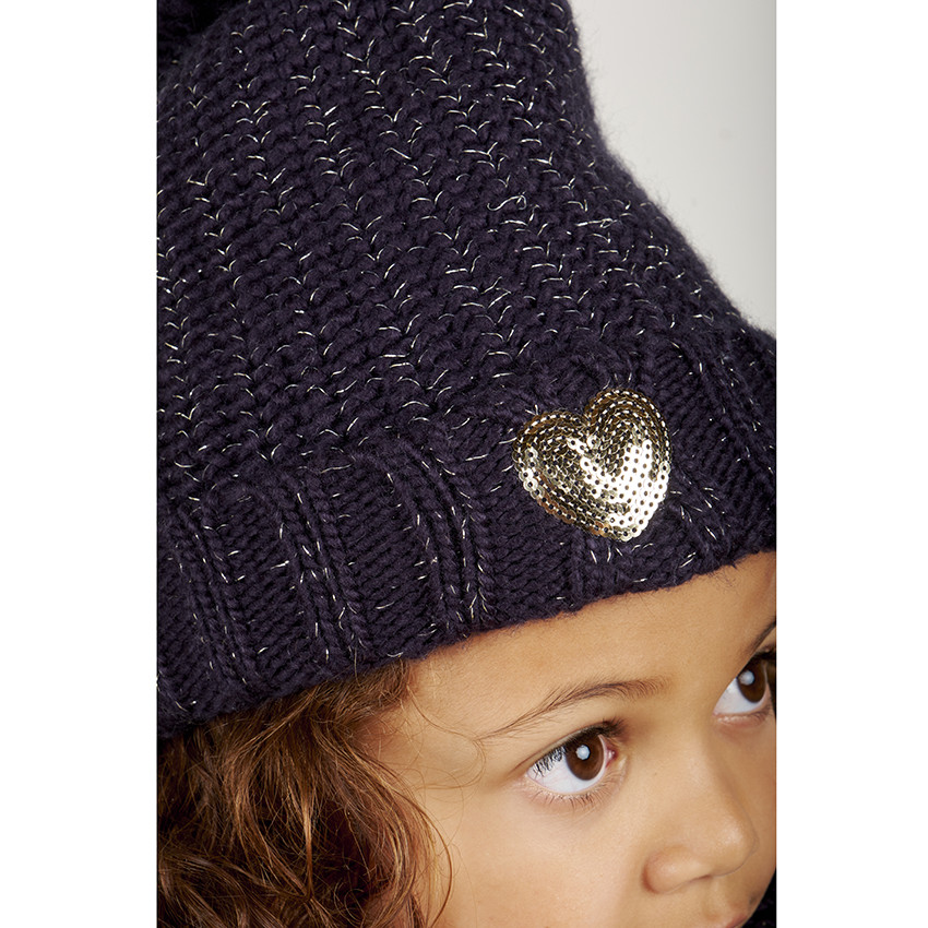 Set muts en nekwarmer in met sherpa gevoerd tricot. 
