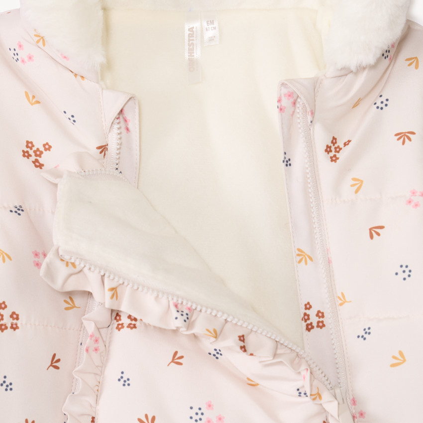 Combi-pilote imprimé fleurs pour bébé fille avec finitions différentes selon l'âge 