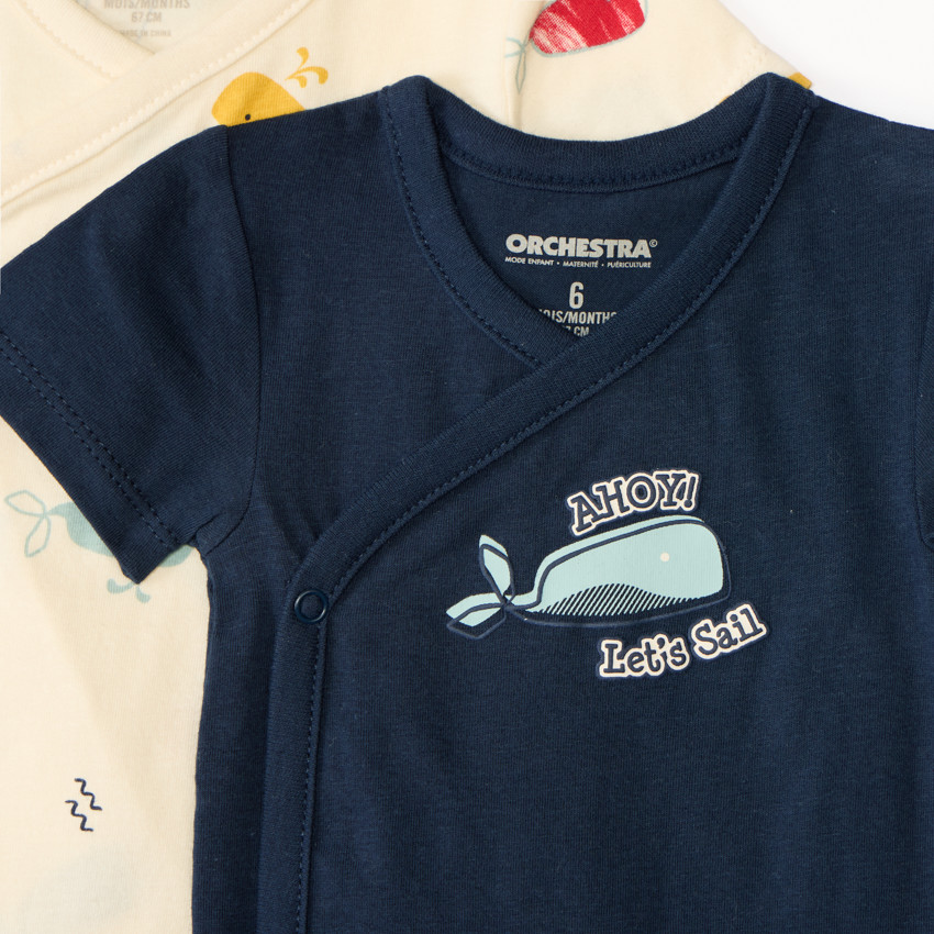 Set van 7 korte mouw rompertjes met maritieme prints voor babyjongens, met verschillende openingen afhankelijk van de leeftijd. 