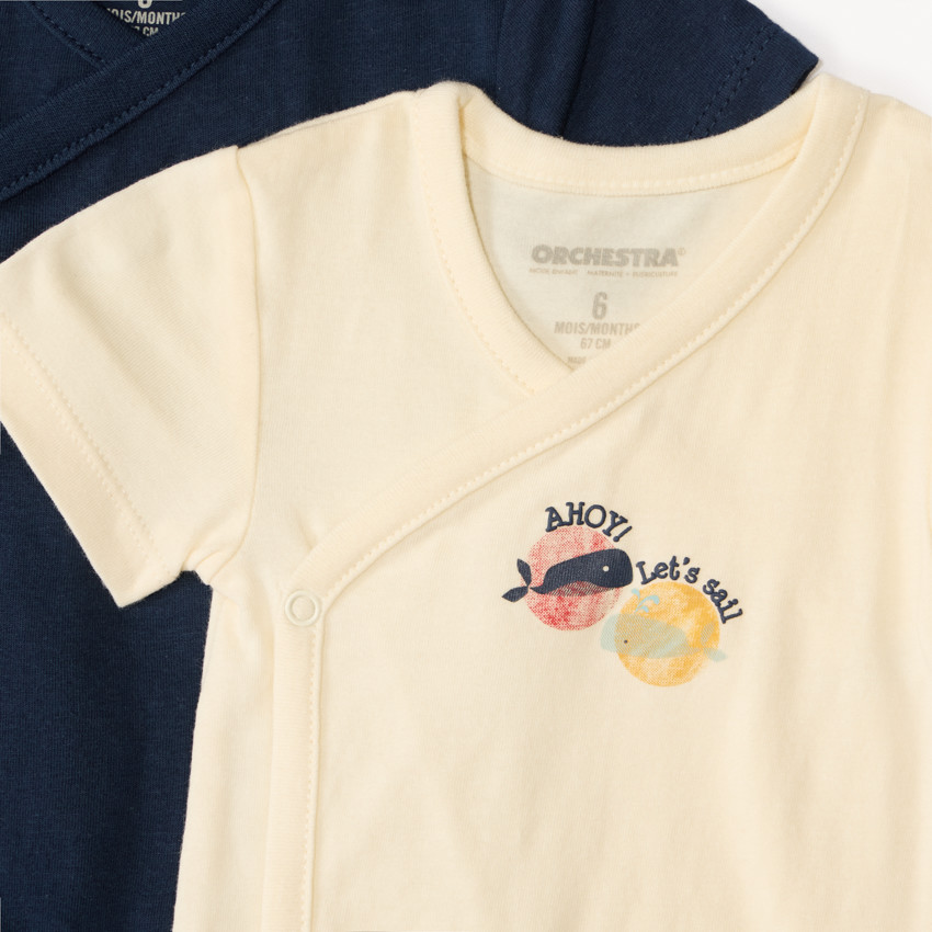 Set van 7 korte mouw rompertjes met maritieme prints voor babyjongens, met verschillende openingen afhankelijk van de leeftijd. 