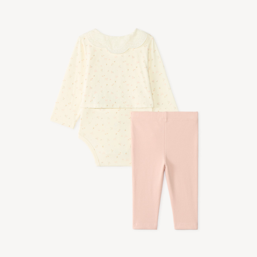 Tweedelig set voor baby meisjes: rompertje met vesteffect en legging. 