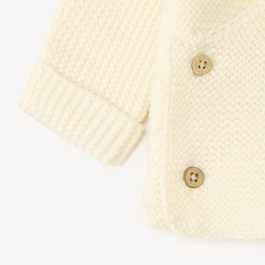 Brassière bébé en tricot uni 