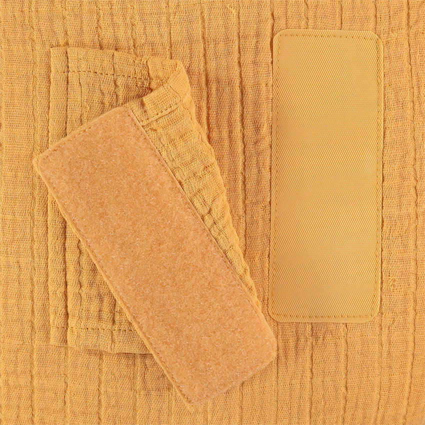 Coussin décoratif rond en tétra modulable en tour de lit ou de parc 