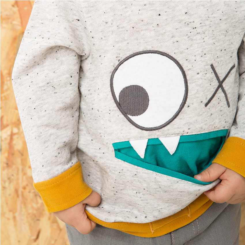 Sweat en molleton neps avec poche forme bouche 