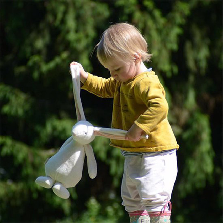 Peluche Mini Bunny avec granules sensoriels Crème/Rose 