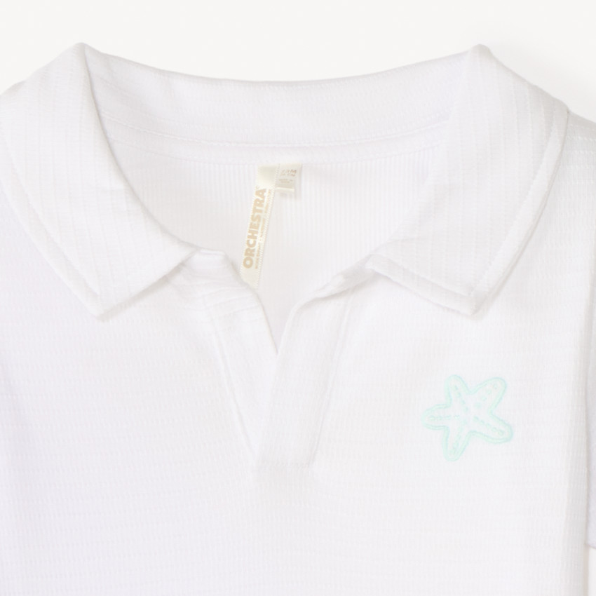 Korte mouw polo in jacquard met geborduurde zee ster voor babyjongen 