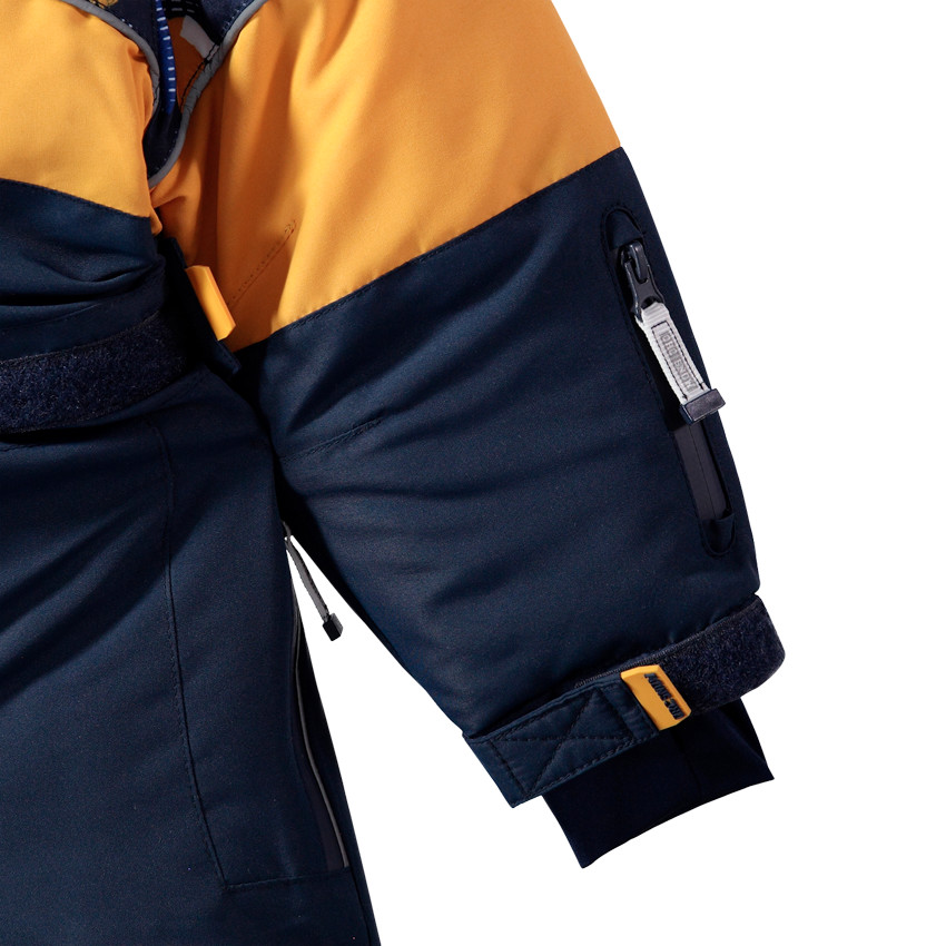 Combinaison de ski à imprimé placé et poches zippées 