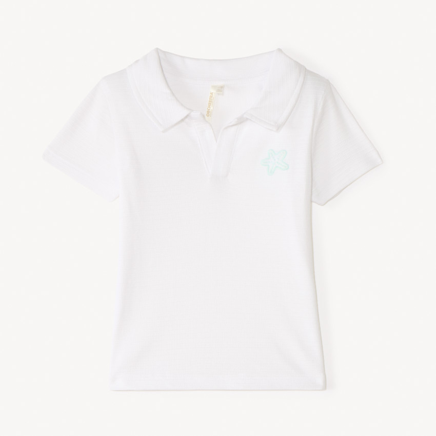 Korte mouw polo in jacquard met geborduurde zee ster voor babyjongen 