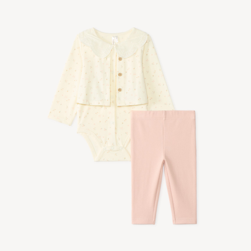 Tweedelig set voor baby meisjes: rompertje met vesteffect en legging. 