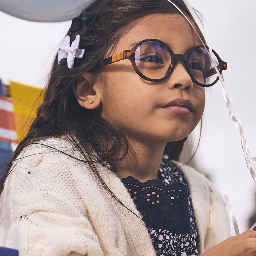 Gilet manches longues uni en tricot point de riz torsadé pour fille 