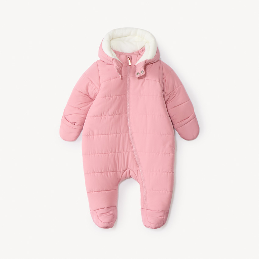 Combi-pilote matelassée pour bébé fille avec finitions différentes selon l'âge 