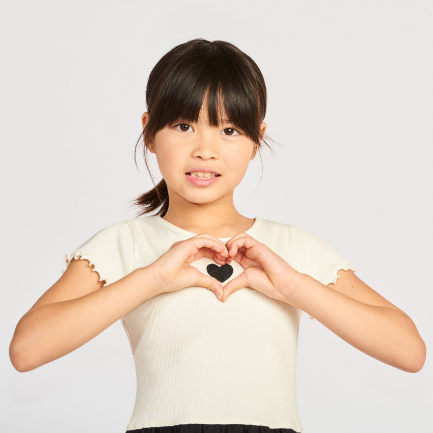 Jurk met korte mouwen in twee materialen met plissé bolrok effect 