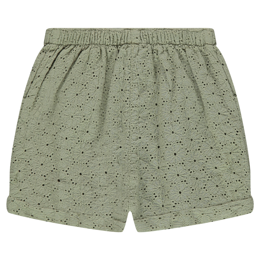Short en broderie anglaise avec frise style ethnique et petits pompons 