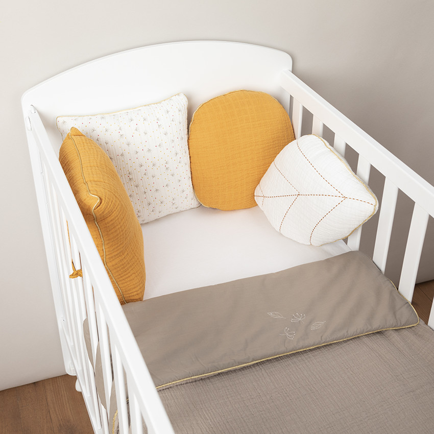 Coussin décoratif rond en tétra modulable en tour de lit ou de parc 